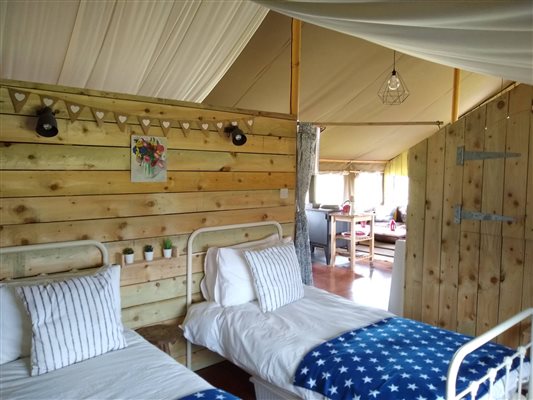 Twin bedroom in safari tent